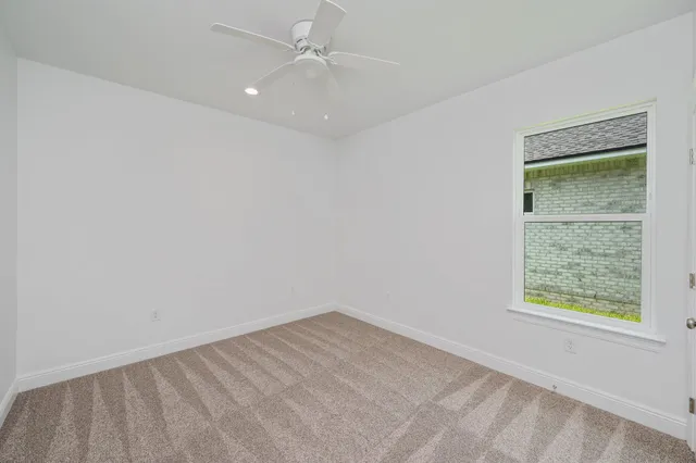 a bathroom with a sink a toilet and bathtub