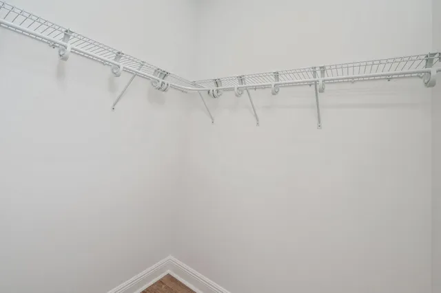 a view of a room with racks on the wall