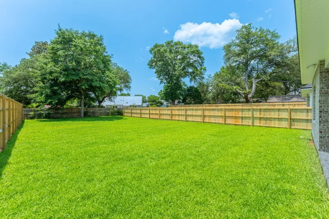 a house view with a garden space