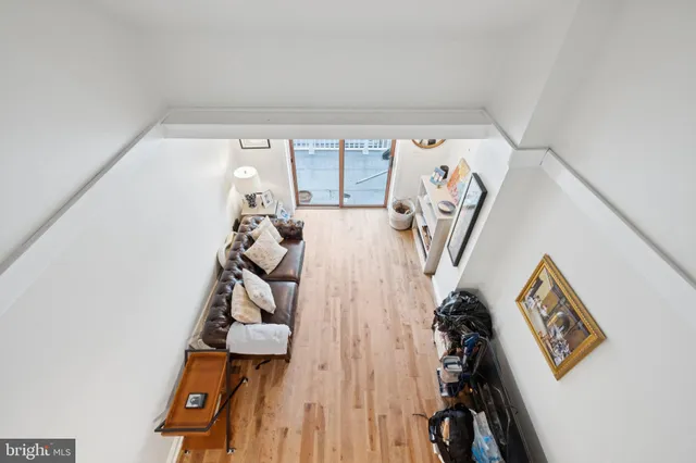 a view of a livingroom with wooden floor
