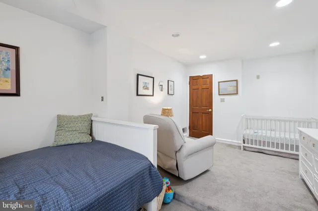 a bedroom with furniture and a couch