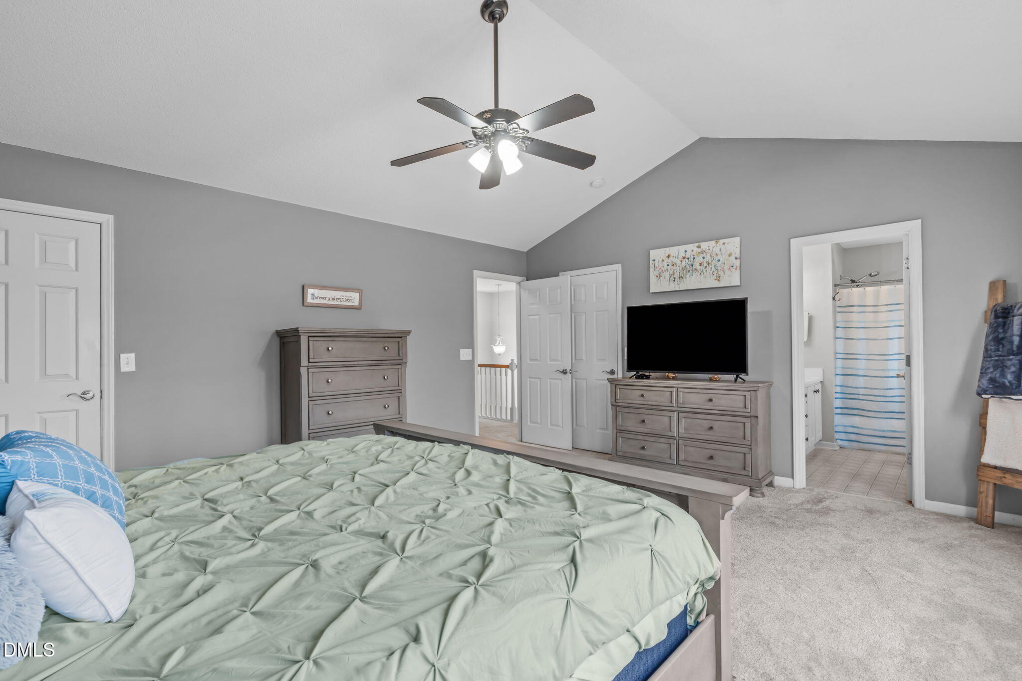 2501 Springfield Park Drive Raleigh, NC 27614 - Photo 32 of 44 a bedroom with a bed and a flat screen tv