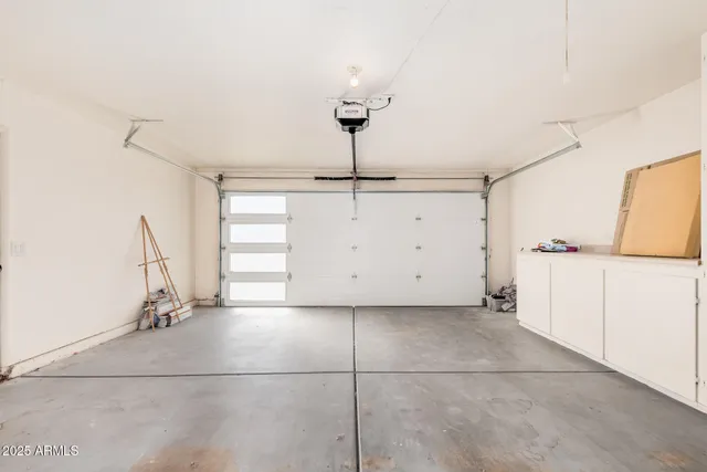 a view of a storage & utility room with closet