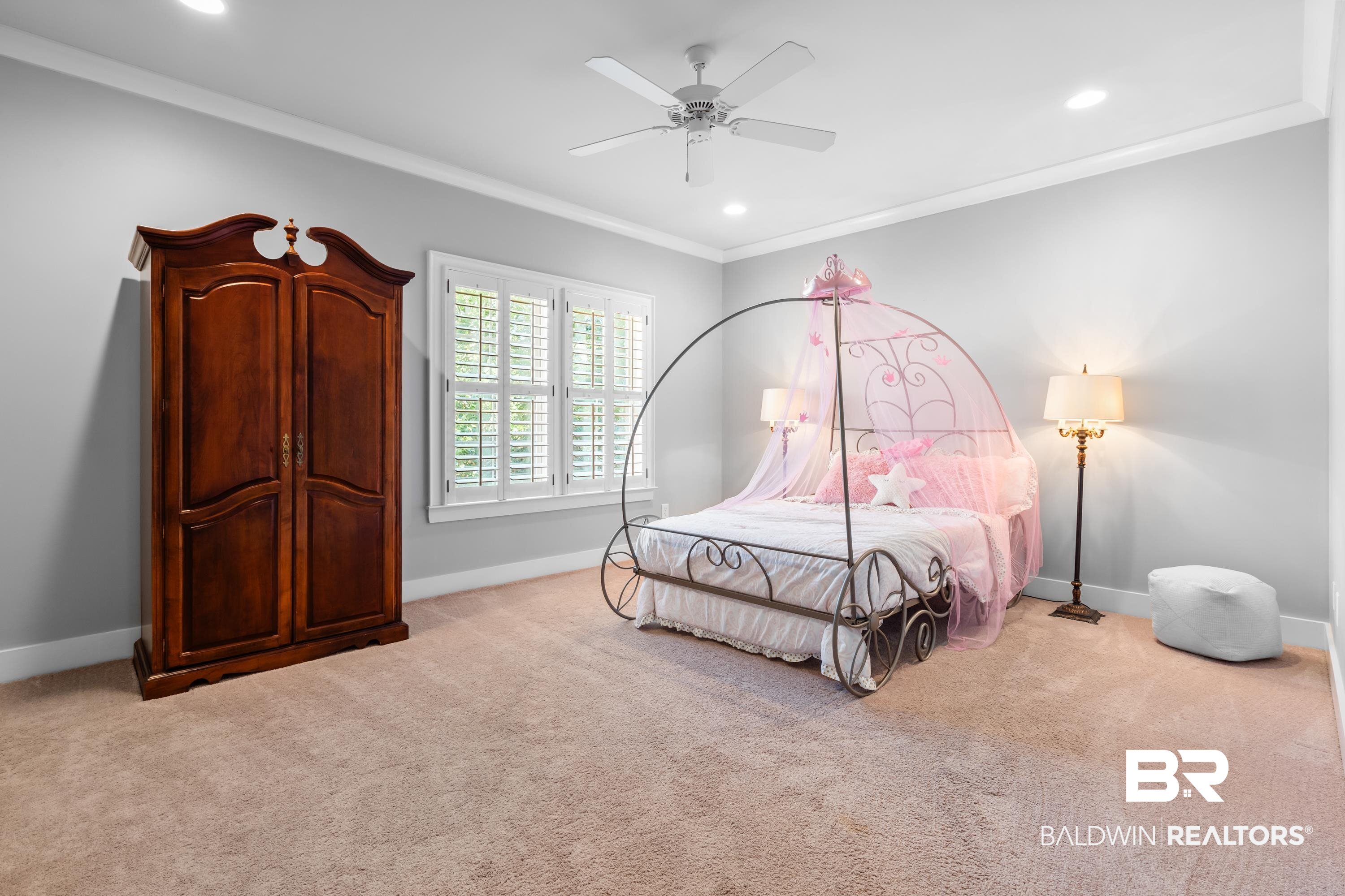 30057 Dolive Ridge Daphne, AL 36527 - Photo 30 of 55 Bedroom with ornamental molding, ceiling fan, and light colored carpet