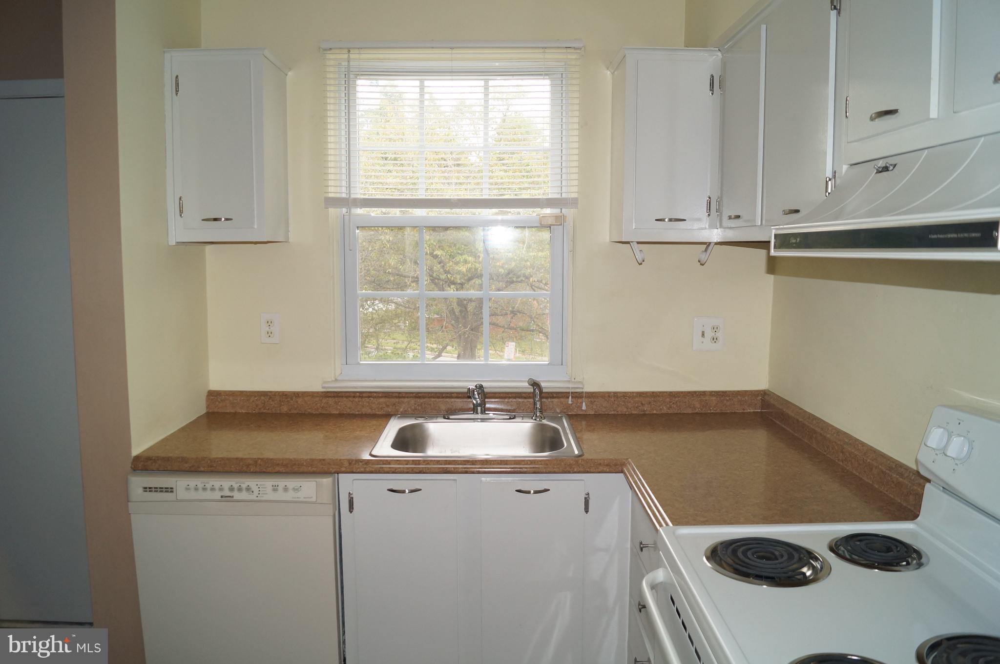 42 Ritters Ridge Court Owings Mills, MD 21117 - Photo 6 of 12 a bathroom with a sink and a window