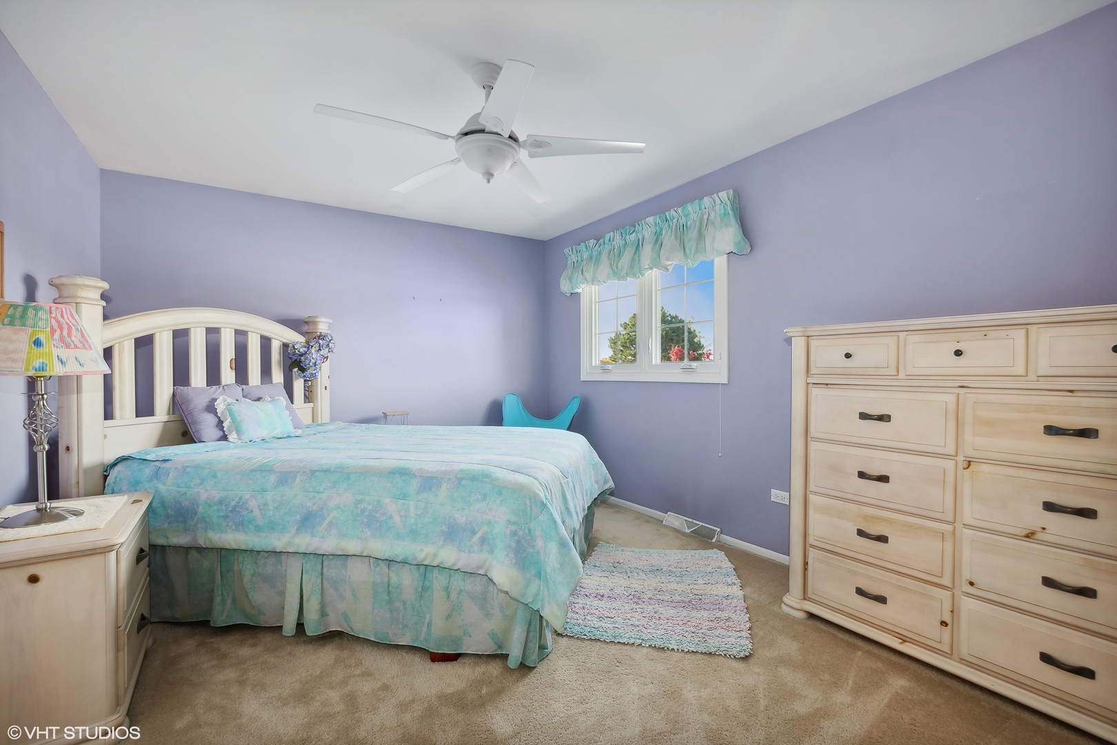 8669 Raintree Lane Orland Park, IL 60462 - Photo 17 of 25 a bedroom with a bed and a dresser