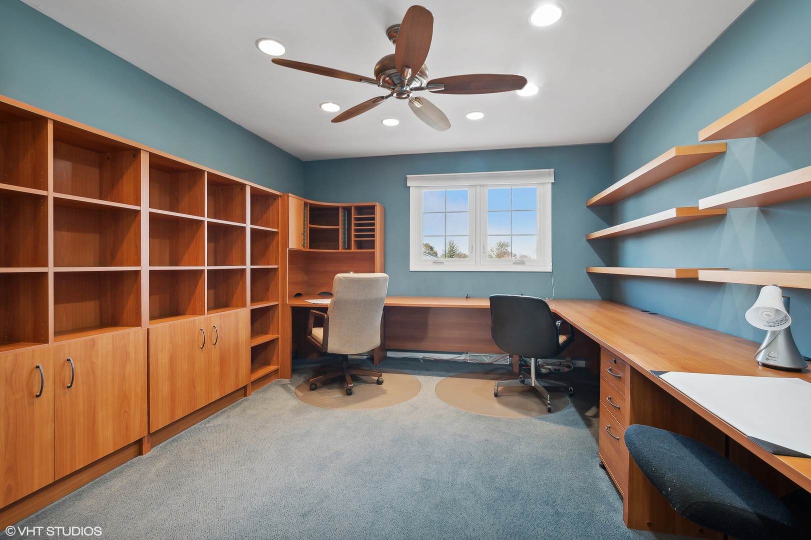 8669 Raintree Lane Orland Park, IL 60462 - Photo 18 of 25 a view of a workspace with furniture and a window