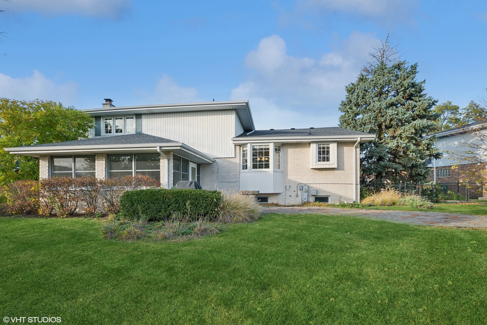 8669 Raintree Lane Orland Park, IL 60462 - Photo 24 of 25 a front view of house with yard and green space