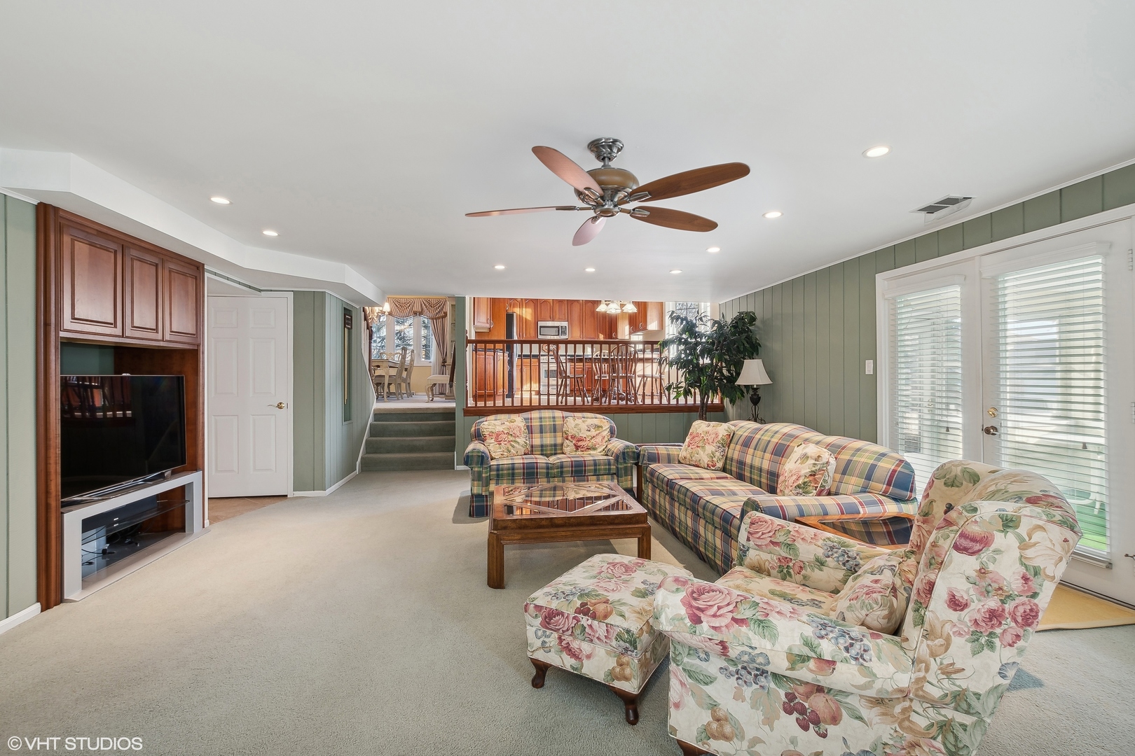 8669 Raintree Lane Orland Park, IL 60462 - Photo 9 of 25 a living room with furniture and a flat screen tv
