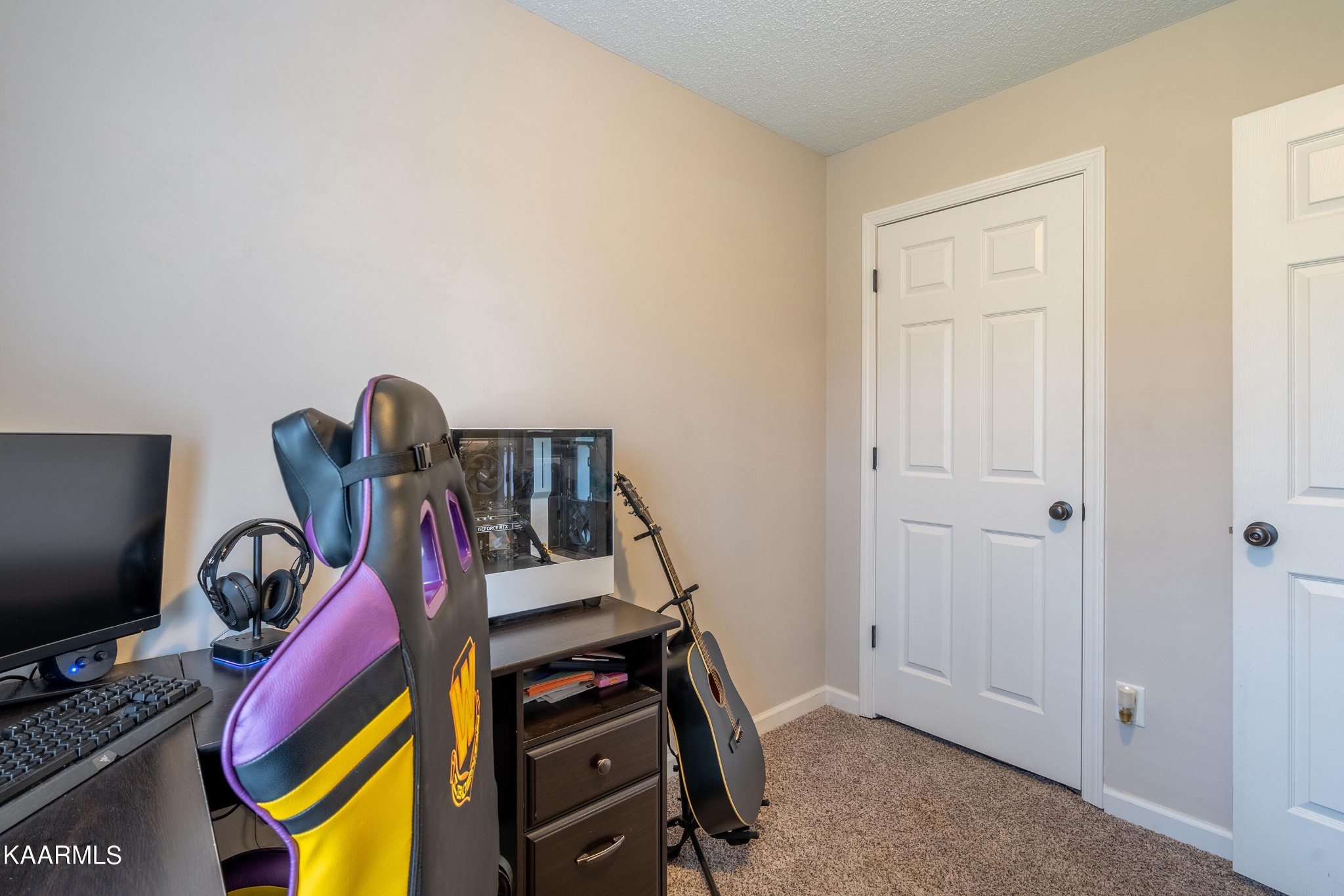 6408 Wilmouth Run Road Knoxville, TN 37918 - Photo 18 of 29 a view of a workspace with furniture and closet