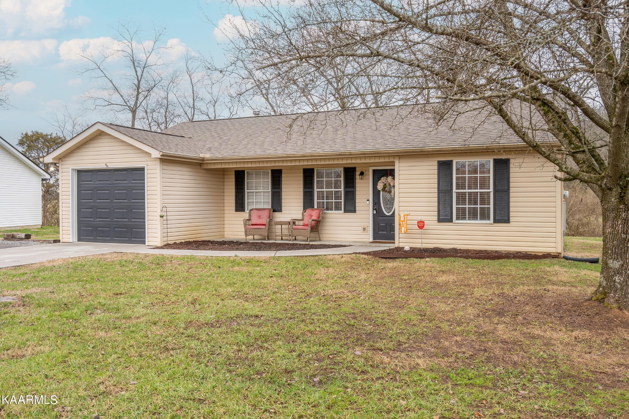 6408 Wilmouth Run Road Knoxville, TN 37918 - Photo 2 of 29 a view of a house with pool and chairs