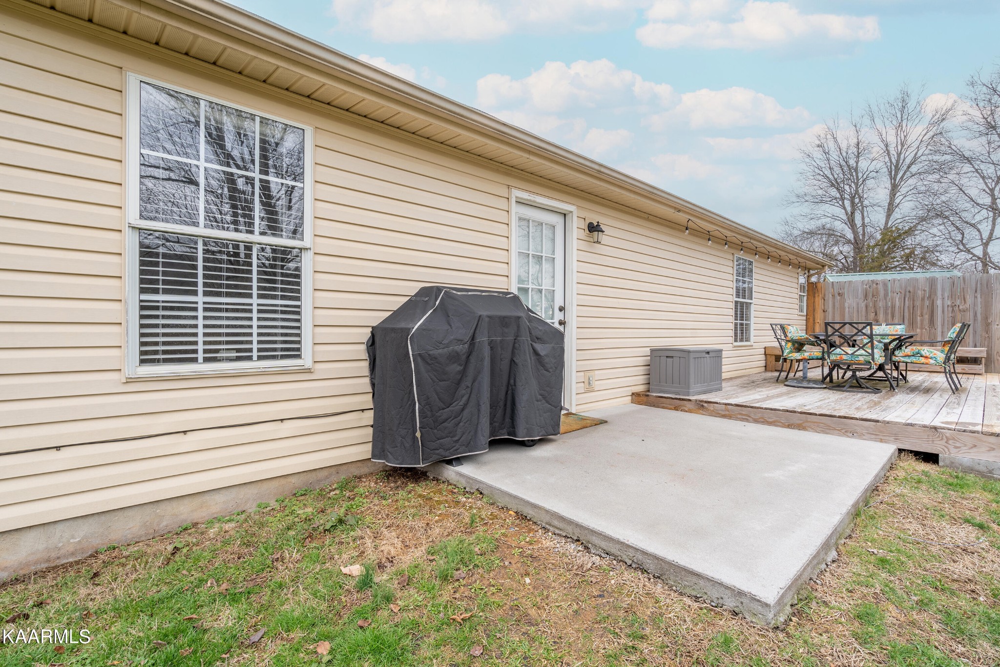 6408 Wilmouth Run Road Knoxville, TN 37918 - Photo 25 of 29 a view of a house with backyard and sitting area