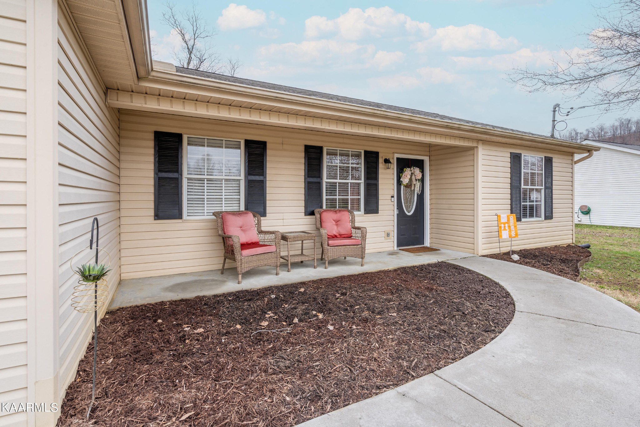 6408 Wilmouth Run Road Knoxville, TN 37918 - Photo 6 of 29 a view of a house with patio