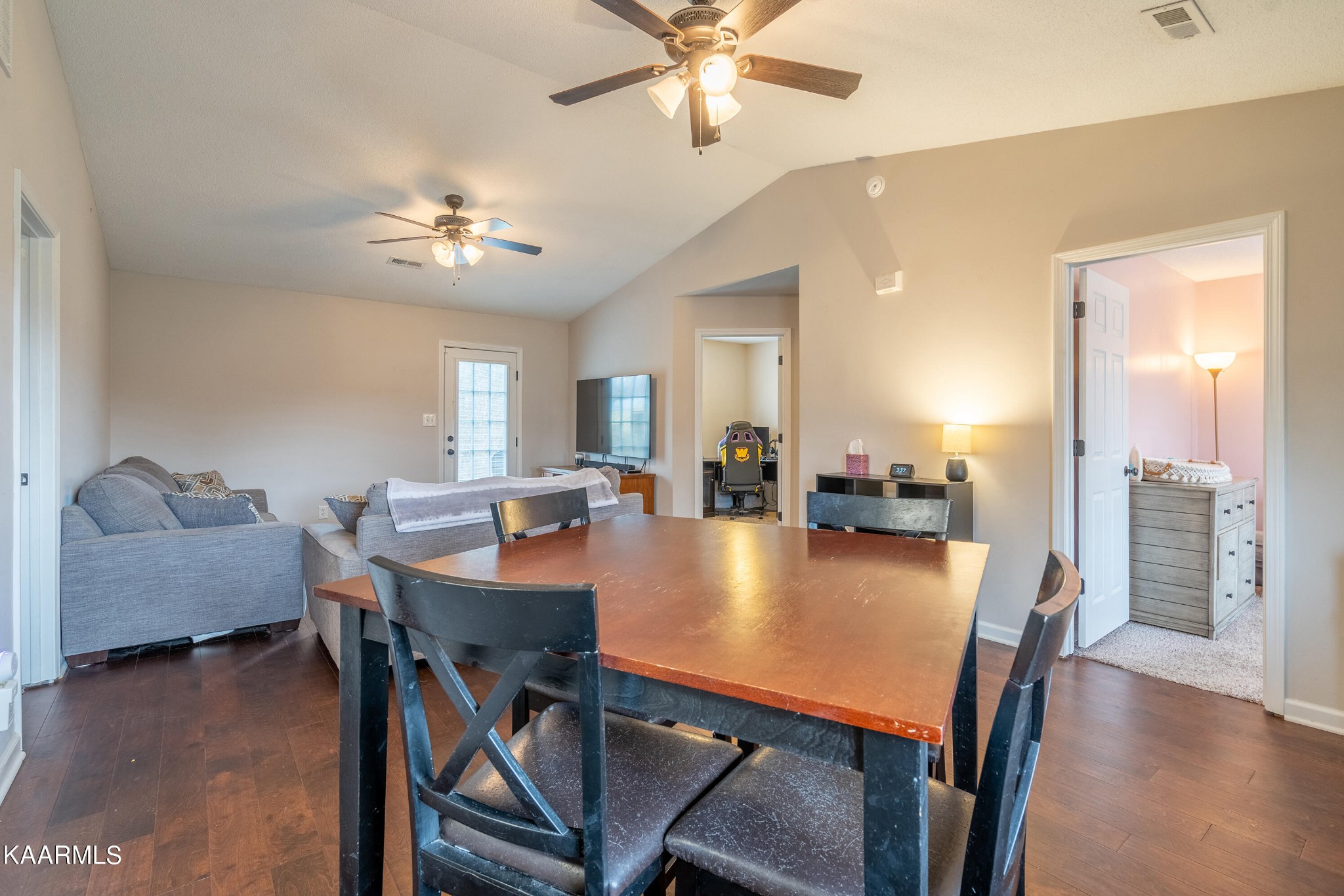6408 Wilmouth Run Road Knoxville, TN 37918 - Photo 10 of 29 a view of a dining room with furniture and wooden floor