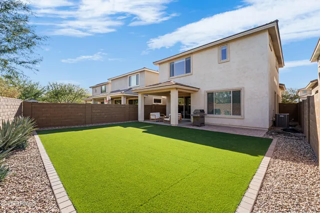 a view of house with a garden
