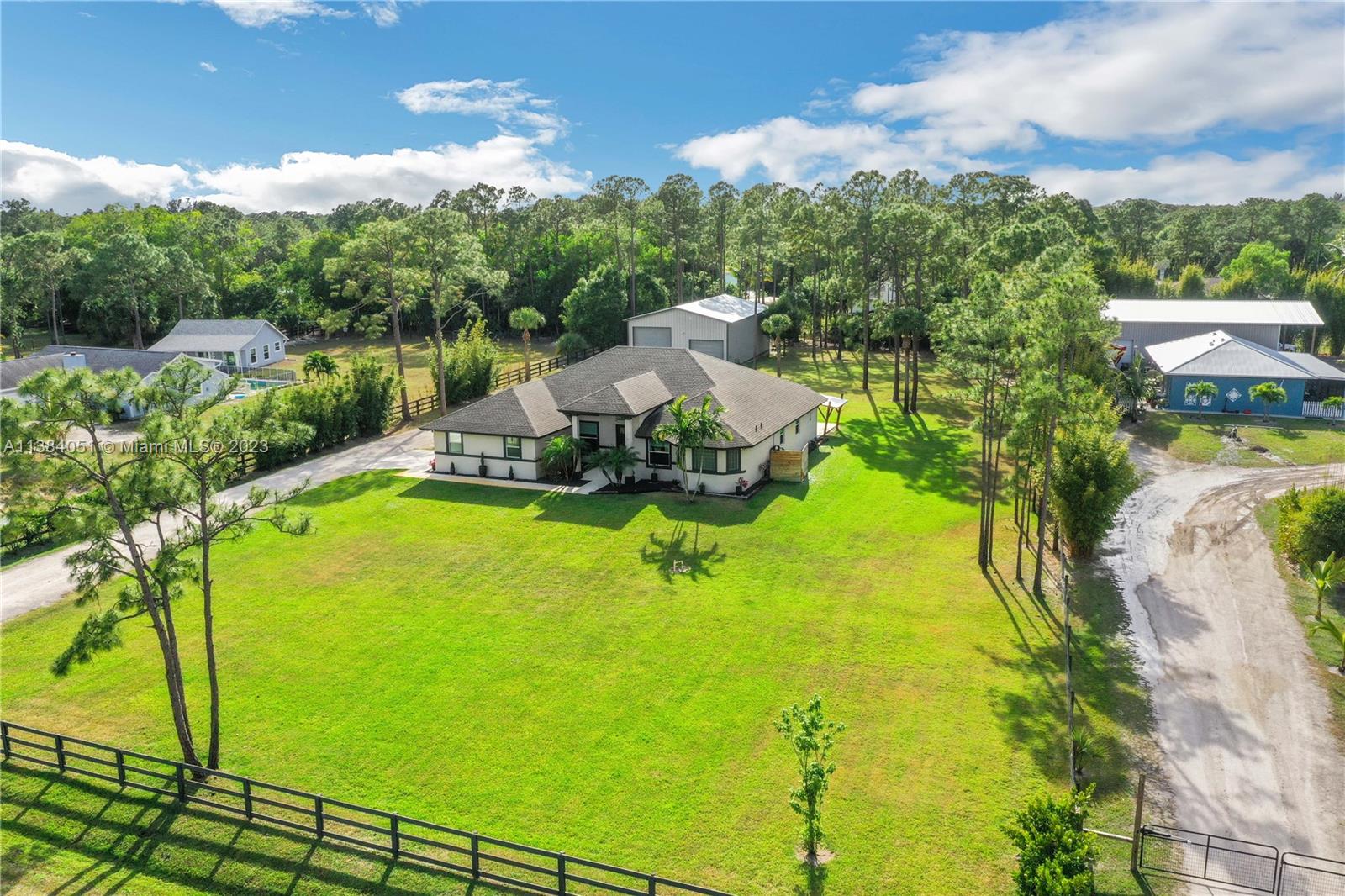 15833 Alexander Run Jupiter, FL 33478 - Photo 33 of 39 a view of a lake with a garden