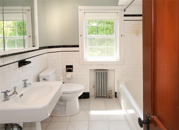 37 Bogandale Road Boston, MA 02132 - Photo 21 of 25 a bathroom with a sink and a toilet