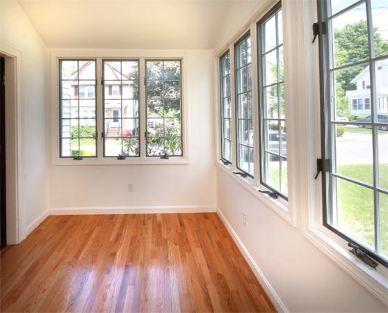 37 Bogandale Road Boston, MA 02132 - Photo 6 of 25 a view of an empty room with wooden floor and a window