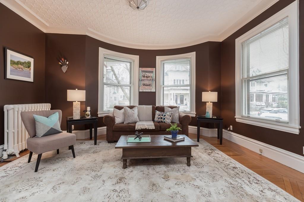 33 Naples Road Brookline, MA 02446 - Photo 11 of 31 a living room with furniture and a window