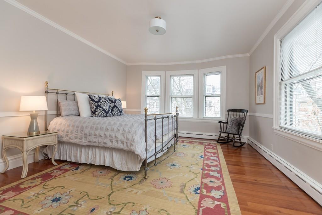 33 Naples Road Brookline, MA 02446 - Photo 19 of 31 a bed room with a bed and a window