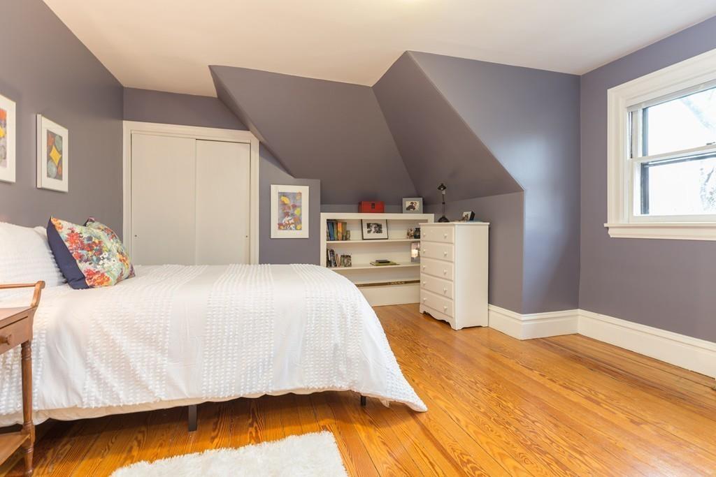 33 Naples Road Brookline, MA 02446 - Photo 26 of 31 a bedroom with a bed and a cabinets