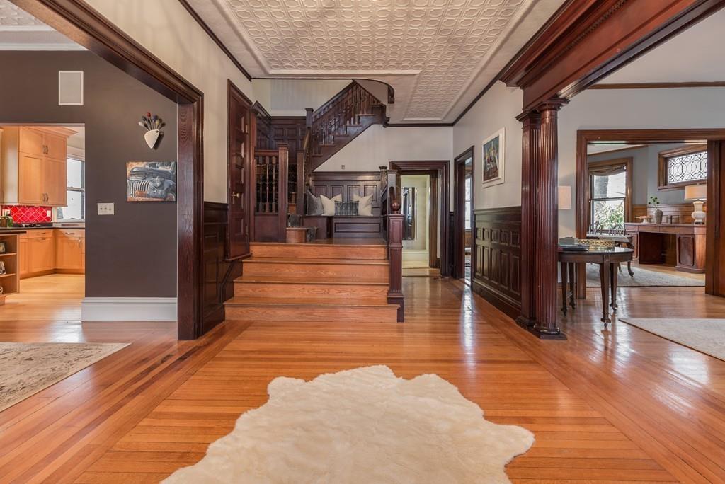 33 Naples Road Brookline, MA 02446 - Photo 3 of 31 a lobby with furniture and wooden floor