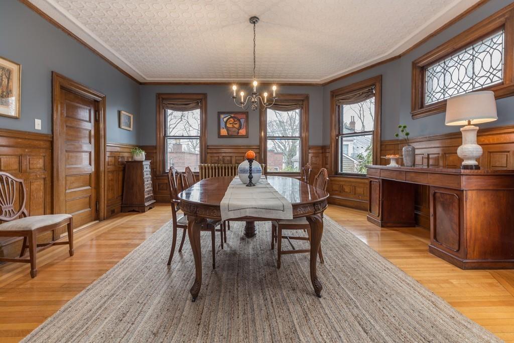 33 Naples Road Brookline, MA 02446 - Photo 8 of 31 a view of a dining room with furniture window and wooden floor