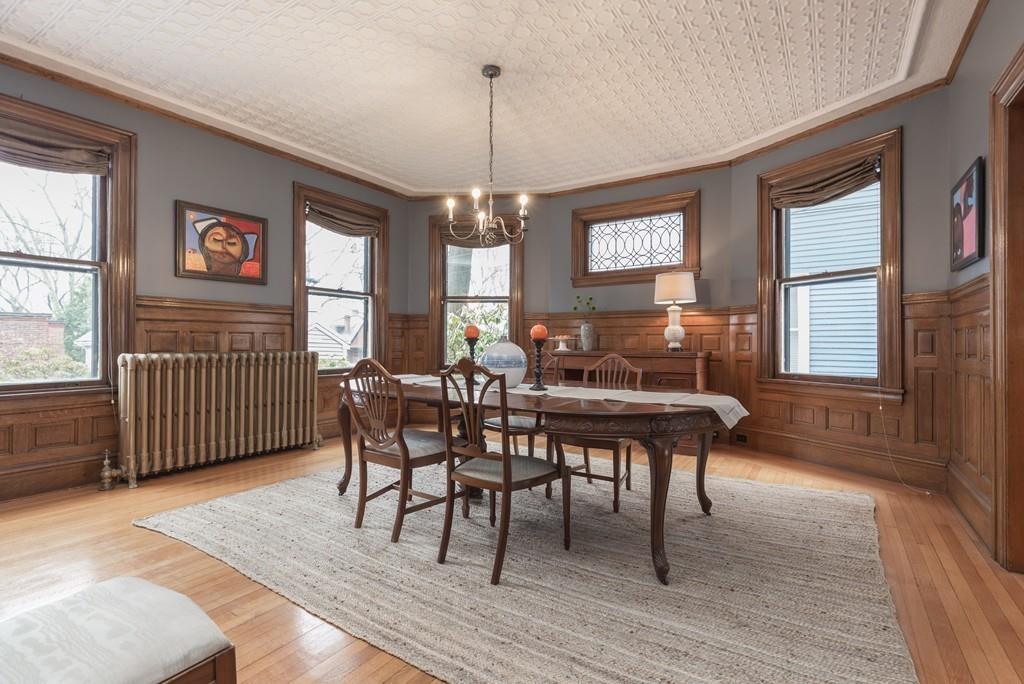 33 Naples Road Brookline, MA 02446 - Photo 9 of 31 a view of a dining room with furniture window and wooden floor
