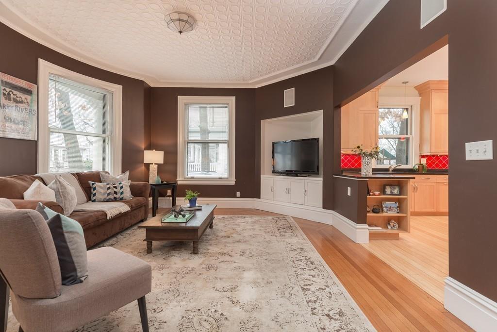 33 Naples Road Brookline, MA 02446 - Photo 10 of 31 a living room with furniture and a flat screen tv