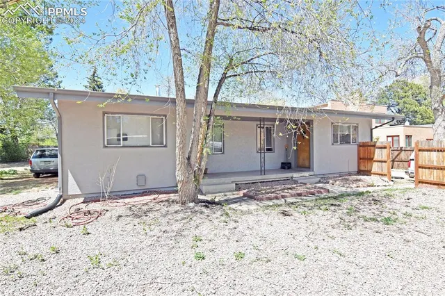 a car parked in front of a house