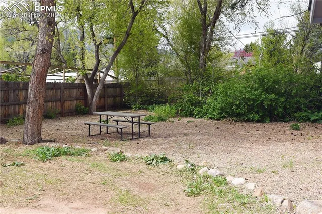 a bathroom with a shower and toilet