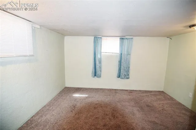 a view of a room with an empty space