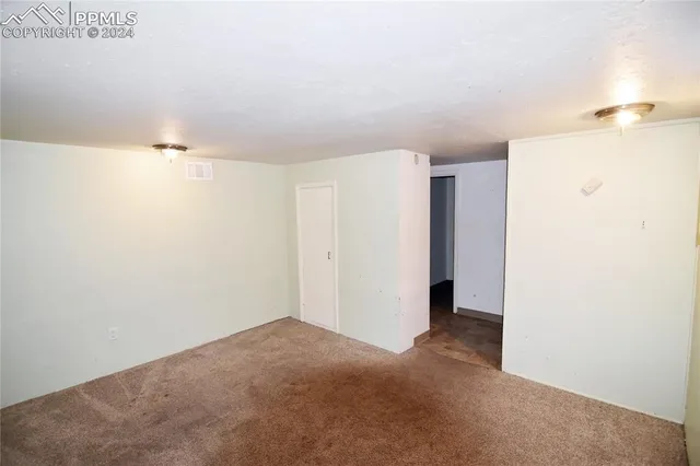 a view of a kitchen cabinets and a utility room