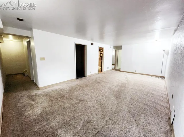 a view of an empty room with window