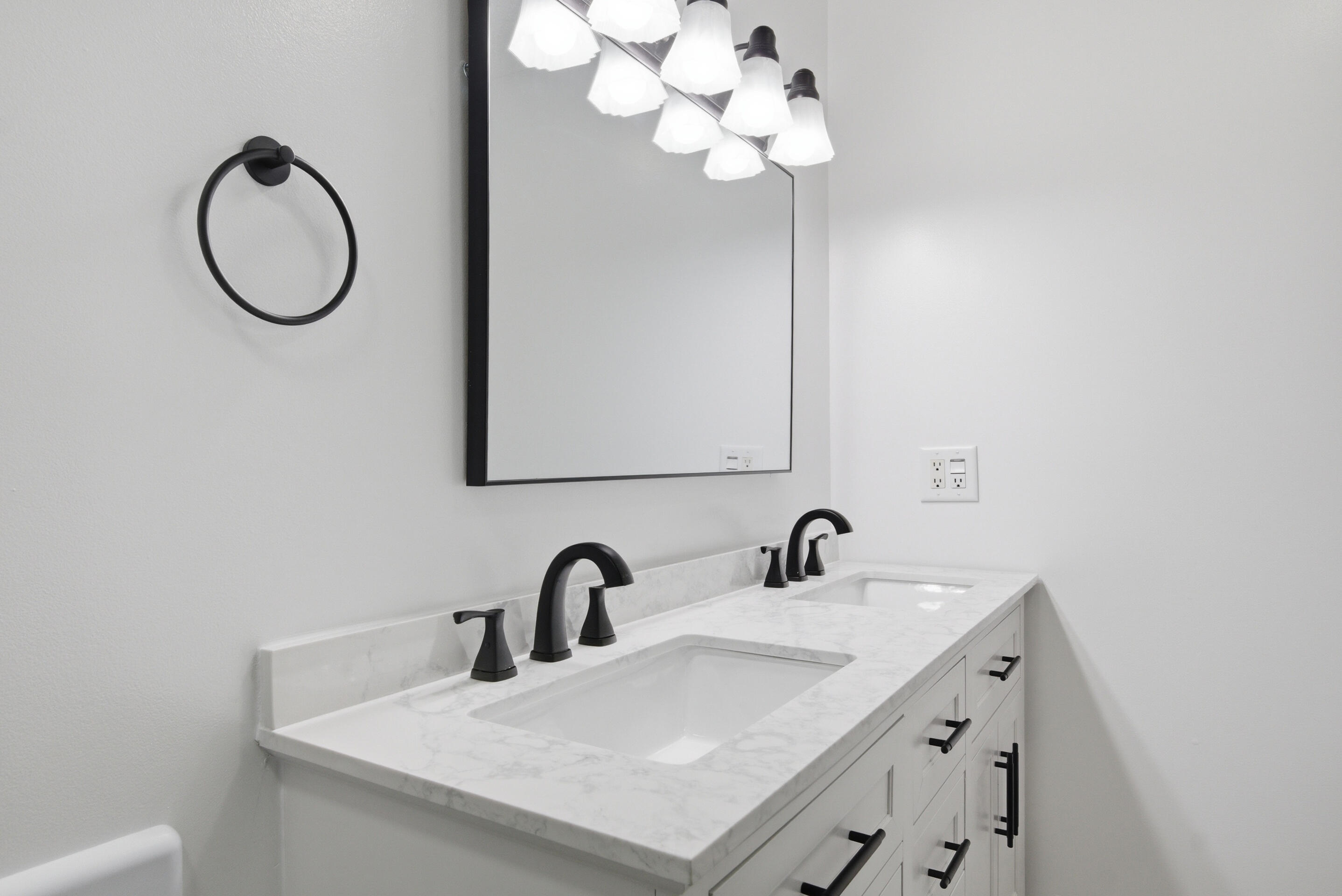 6458 Piney Woods Road Riner, VA 24149 - Photo 19 of 50 a bathroom with a sink vanity and a mirror