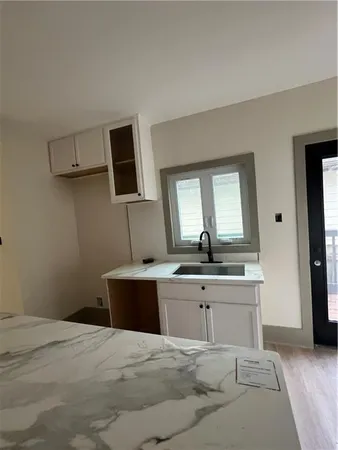 a view of living room with granite countertop furniture and fireplace