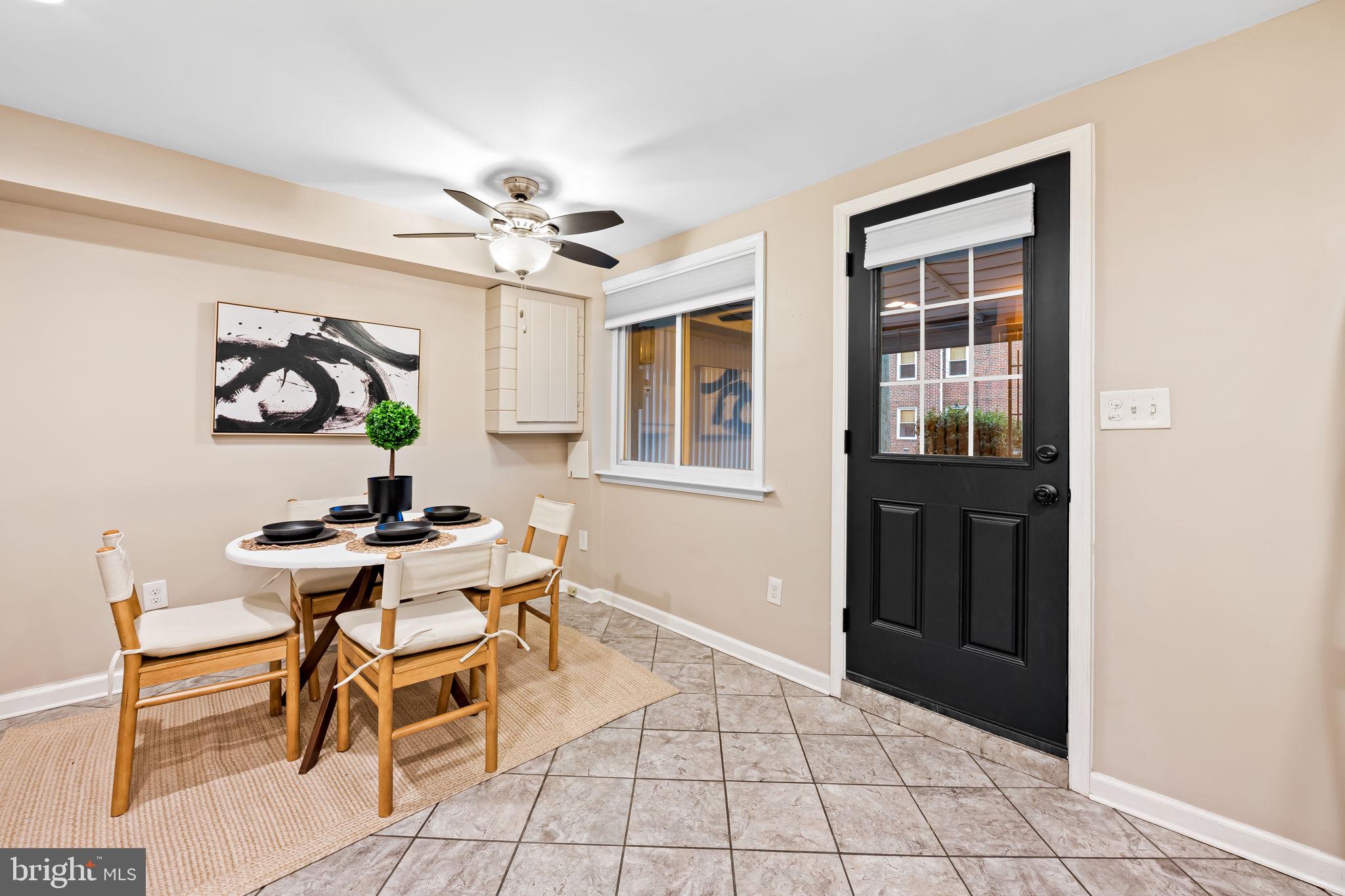 1817 Dunmere Road Baltimore, MD 21222 - Photo 13 of 27 a view of a workspace with furniture and a window