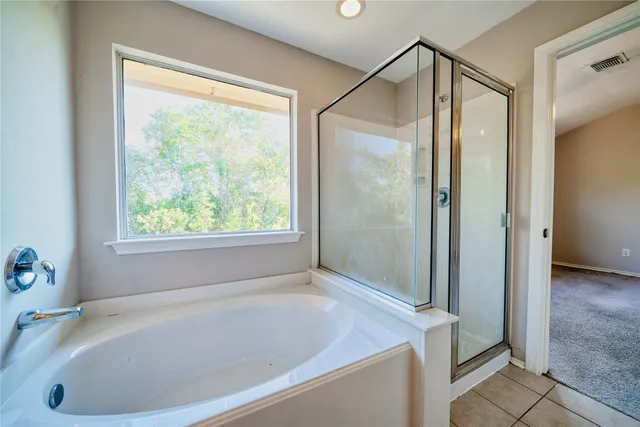 a backyard of a house with lots of green space