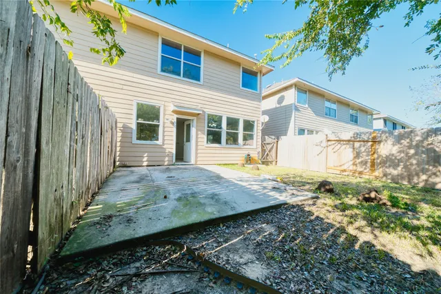 an aerial view of a house with a garden