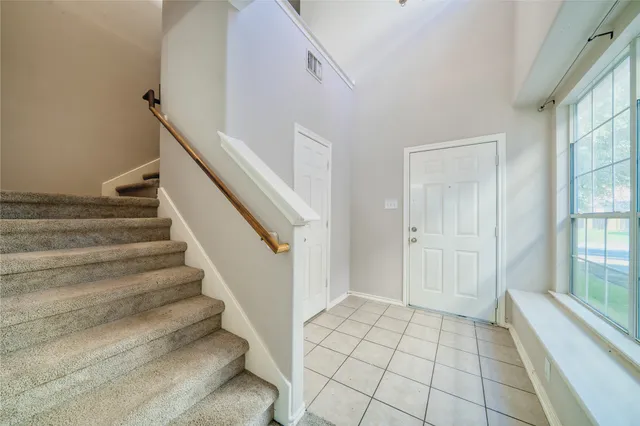 a view of an entryway with staircase