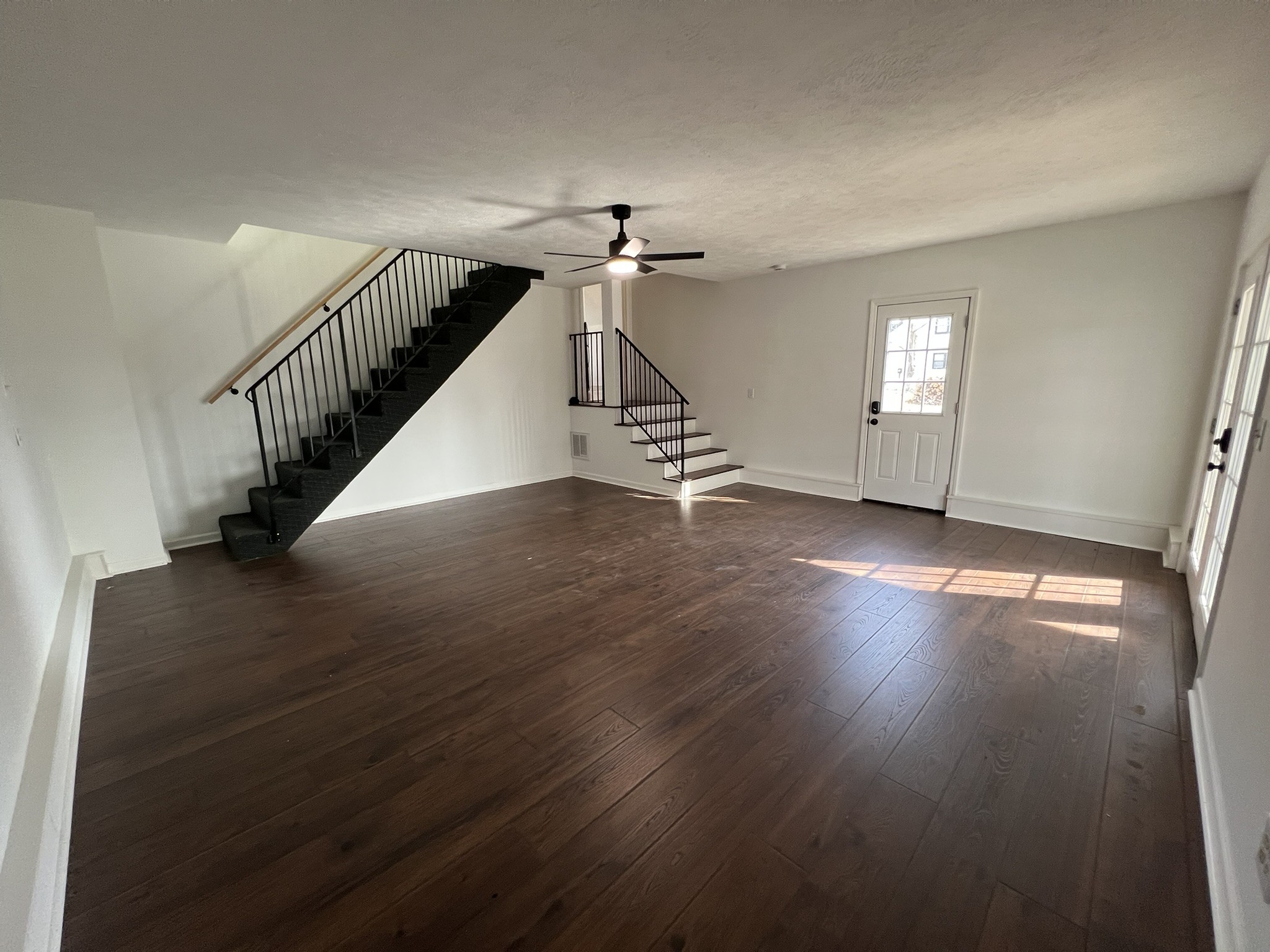 2654 Crosspark Drive Murfreesboro, TN 37129 - Photo 16 of 36 a view of a room with wooden floor and staircase