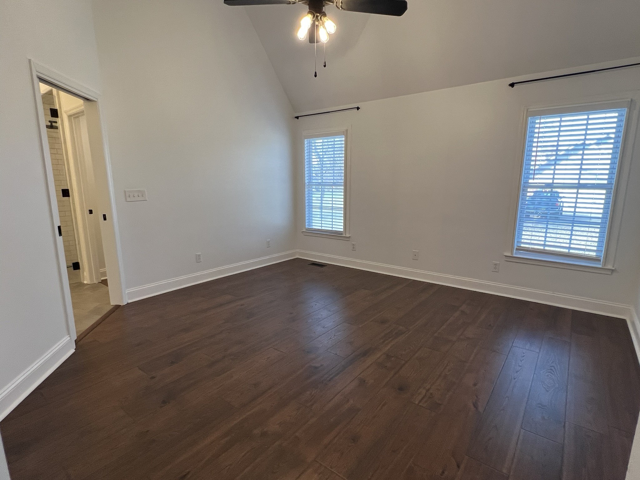 2654 Crosspark Drive Murfreesboro, TN 37129 - Photo 24 of 36 an empty room with wooden floor and windows