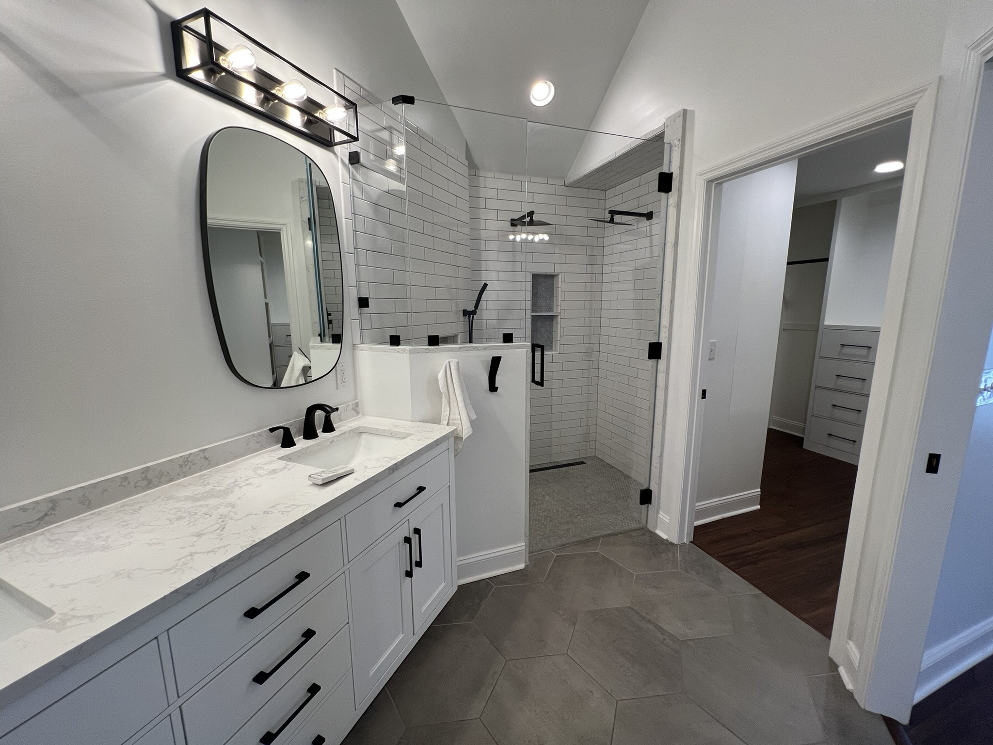 2654 Crosspark Drive Murfreesboro, TN 37129 - Photo 27 of 36 a bathroom with a double vanity sink mirror and shower