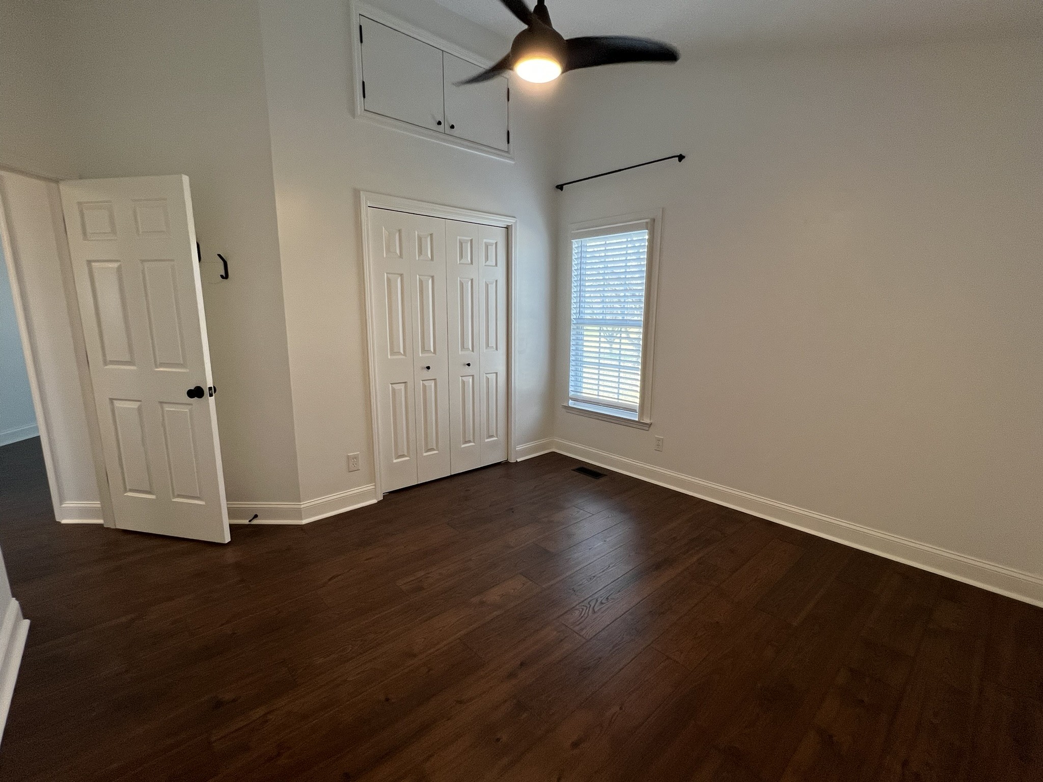 2654 Crosspark Drive Murfreesboro, TN 37129 - Photo 32 of 36 an empty room with wooden floor and windows