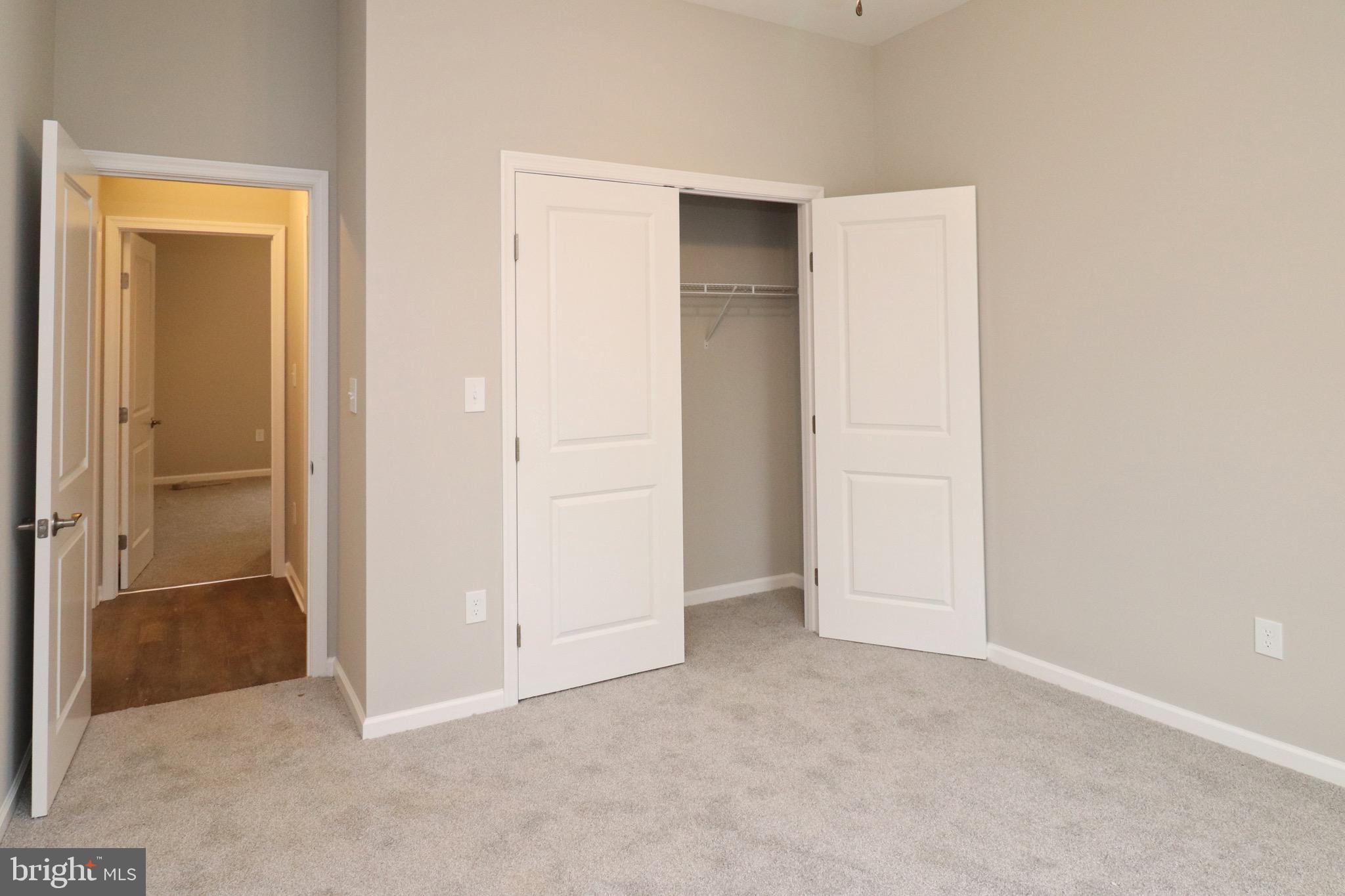 30576 Skipjack Circle, Unit 47 Princess Anne, MD 21853 - Photo 6 of 11 an empty room with closet