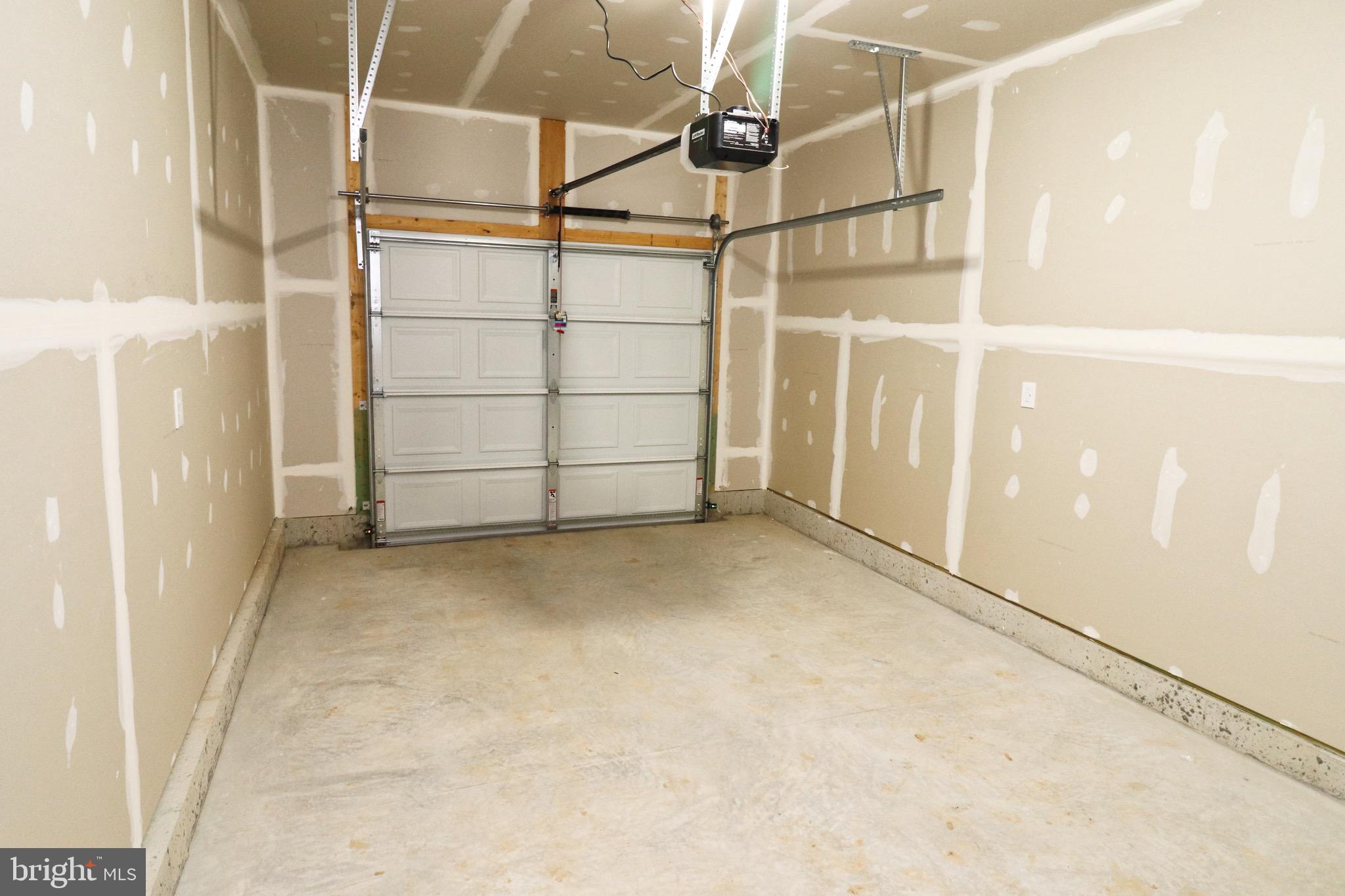 30576 Skipjack Circle, Unit 47 Princess Anne, MD 21853 - Photo 8 of 11 a view of a garage