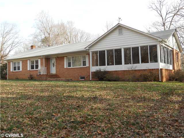 2361 Camelback Road Maidens, VA 23102 - Photo 1 of 12 a front view of a house with a garden