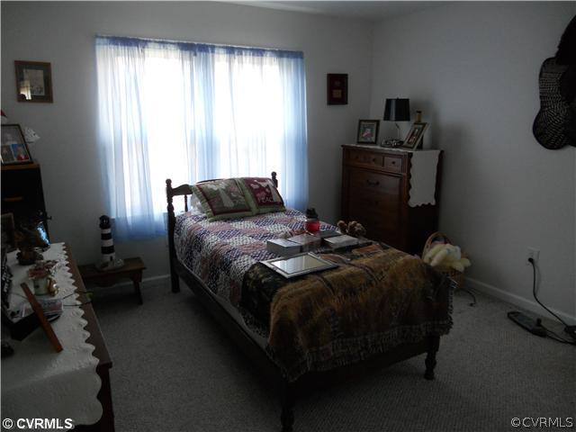 2361 Camelback Road Maidens, VA 23102 - Photo 7 of 12 a bedroom with a bed and a window
