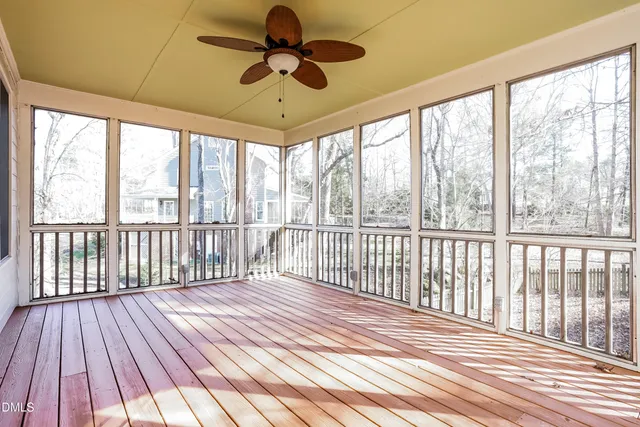 a view of a porch with wooden floor