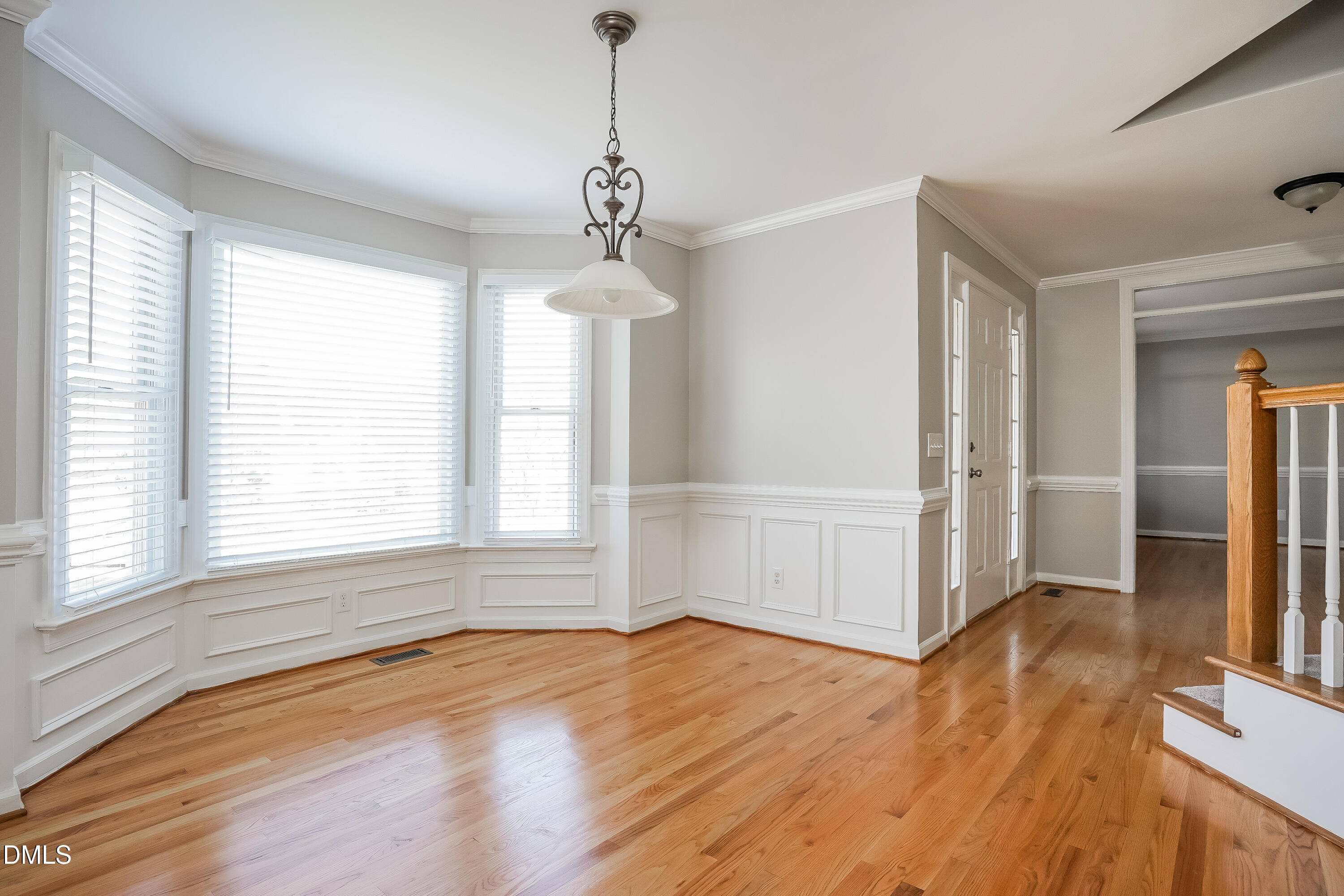 17 Edinburgh Place Clayton, NC 27527 - Photo 5 of 17 a view of empty room with wooden floor and fan